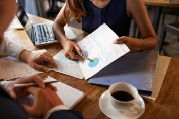 Team looking over charts