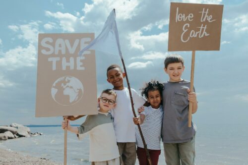 Children picketing for the climate, to demonstrate why Green Commerce has become one of the big shopping trends of 2023